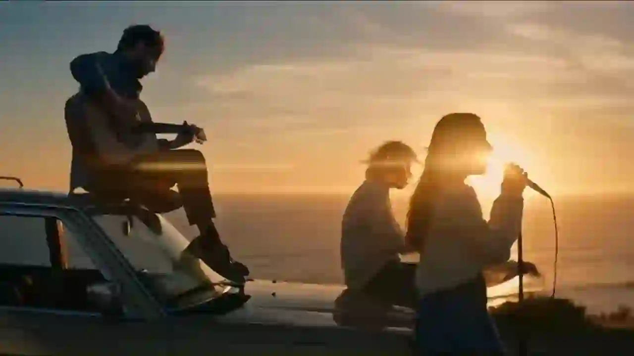 Singer and band performing at sunset in an AI-generated music video